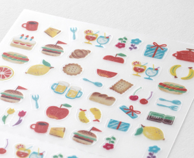 A sheet of colorful food and drink stickers on a white background, featuring illustrations of burgers, lemons, cupcakes, drinks, flowers, and gifts.