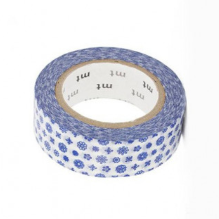 A roll of washi tape with a blue and white floral pattern, wound on a cardboard core with the brand 'mt' visible on the inner label, set against a plain white background.
