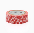 A roll of washi tape with a red geometric star pattern on a light pink base, shown on a clean white background. The brand name 'mt' is partially visible on the inner cardboard core.