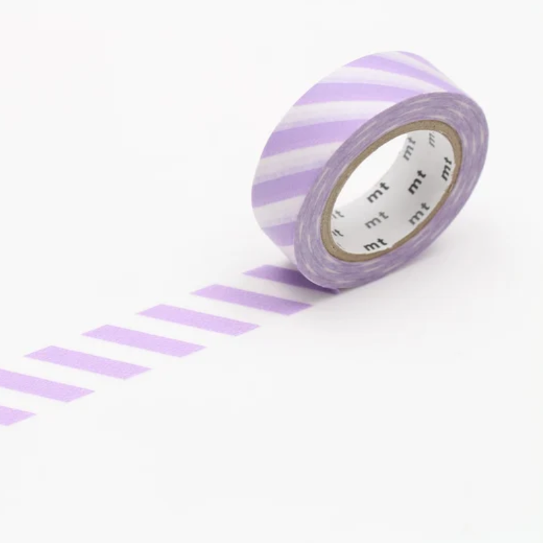 A roll of washi tape with alternating light purple and white diagonal stripes, shown partially unrolled on a clean white background. The brand name 'mt' is visible on the inner cardboard core.