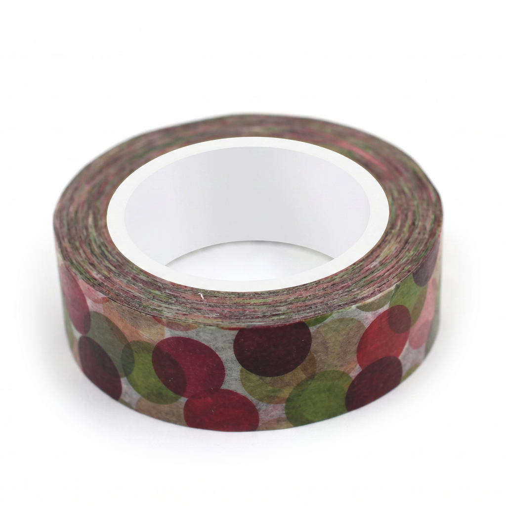 A roll of decorative washi tape with a pattern of overlapping red, green, and burgundy circles on a light background, shown on a white studio background.