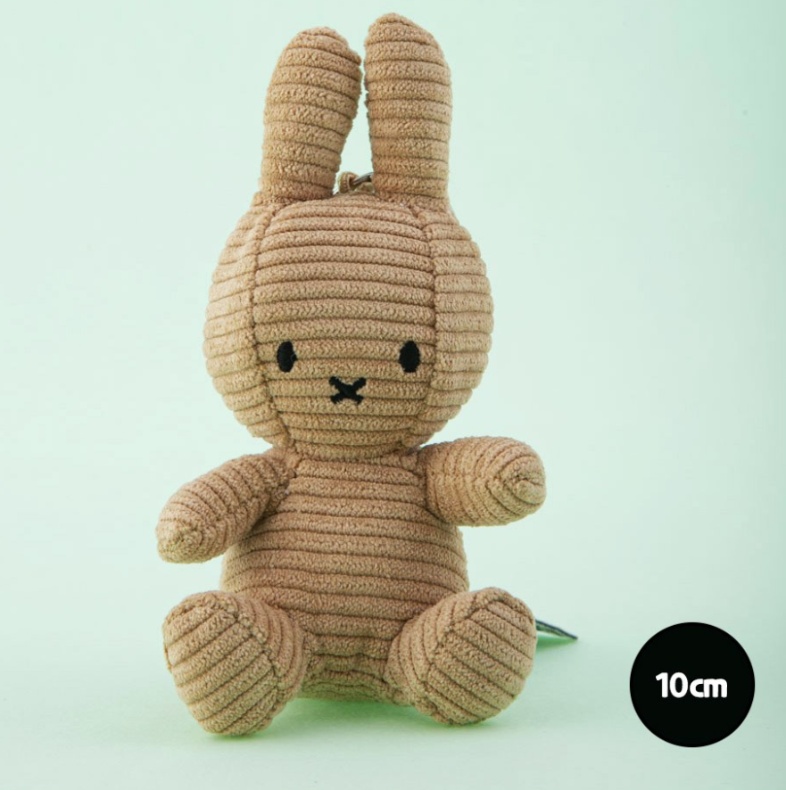 Miffy - A small knitted bunny plush keyring toy in a light tan color, sitting against a pale mint green background. A black circular badge in the bottom right corner reads '10cm'.