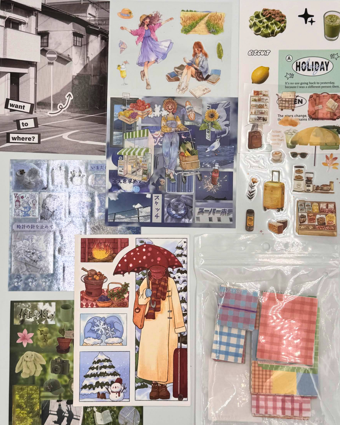 A collection of Japanese-style sticker sheets and decorative paper packs arranged on a white background. The stickers feature various illustrated scenes, characters, travel motifs, and plaid patterned squares, including a large collage sheet, a holiday-themed sheet, a street scene sheet, and a pack of plaid washi tape or paper squares in a clear plastic bag.